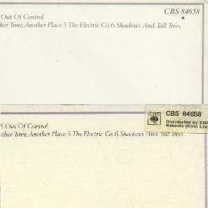 (the printed (above) and stickered (below) CBS back cover variation